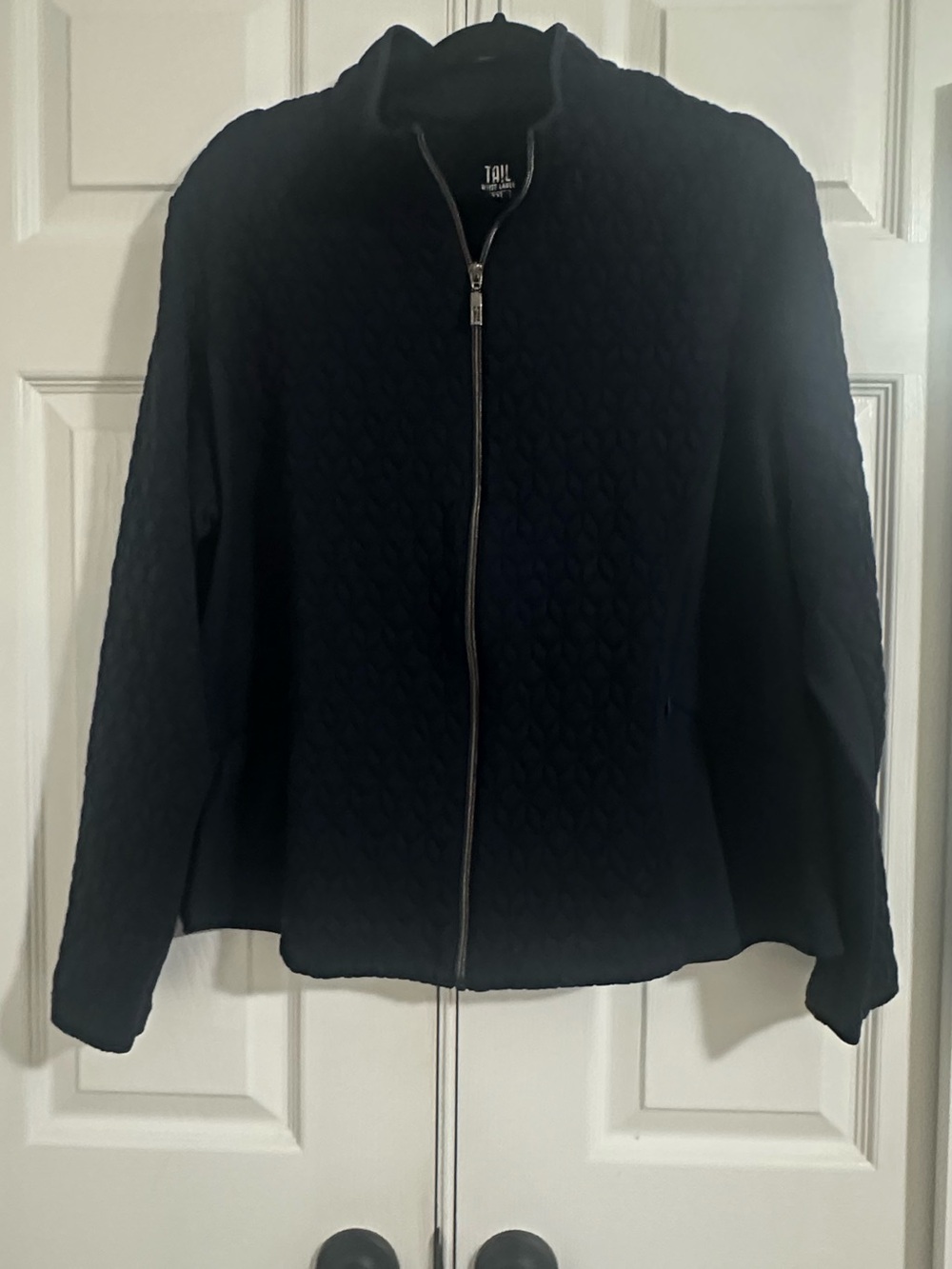 Tail white label - navy quilted golf jacket.